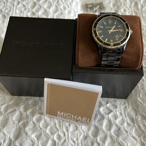 Black and Gold Micheal Kors watch